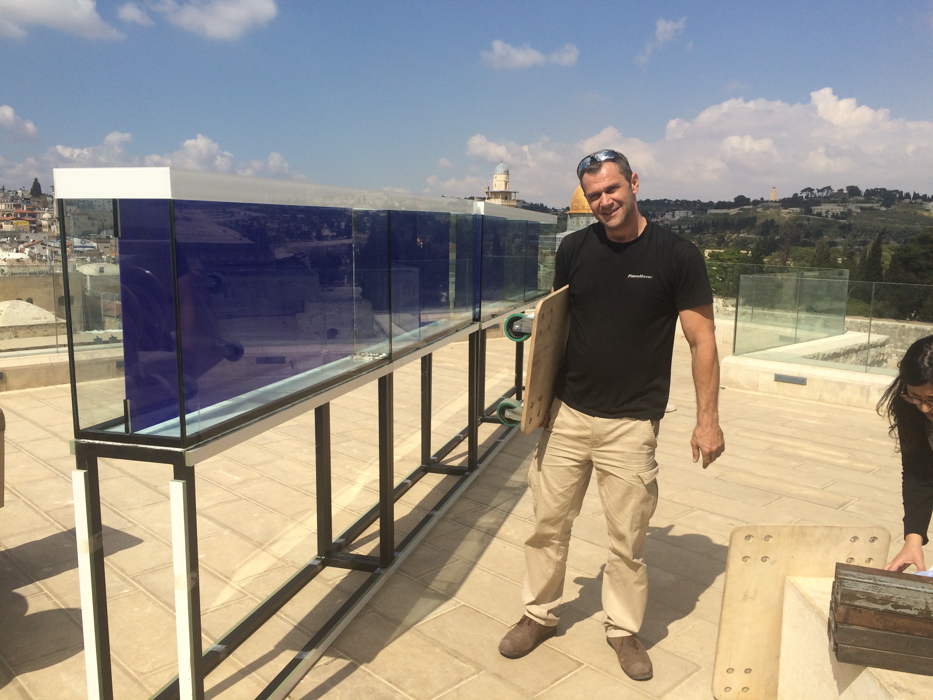 הובלת פסנתר לגג